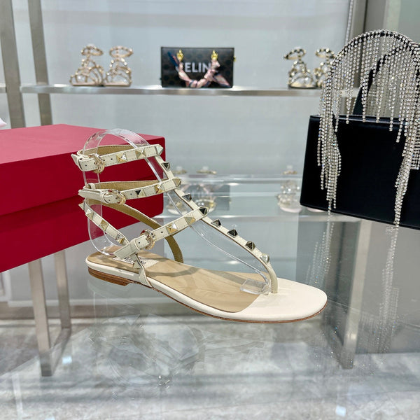 SANDALO INFRADITO ROCKSTUD CON CINTURINI IN PELLE DI VITELLO BIANCA