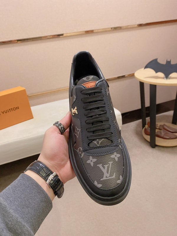 LV TRAINER IN BLACK MIX DARK BROWN CALFSKIN