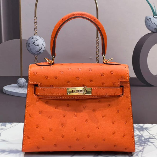 KELLY BAG 20 IN FIRE ORANGE OSTRICH LEATHER WITH GOLD HARDWARE (MADE - TO - ODER)