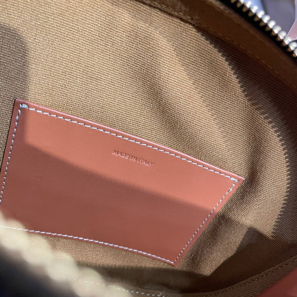 TOP HANDLE BAG 20 IN BLACK TRIOMPHE CANVAS AND BROWN CALFSKIN