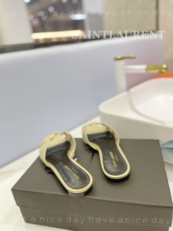 SL TRIBUTE SLIPPERS PASTEL YELLOW CALFSKIN