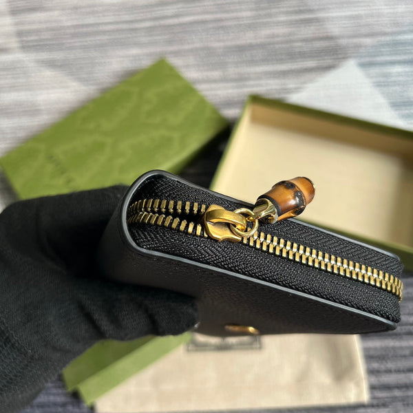 PORTAFOGLIO GG MARMONT 19 CON ZIP IN PELLE DI VITELLO NERA