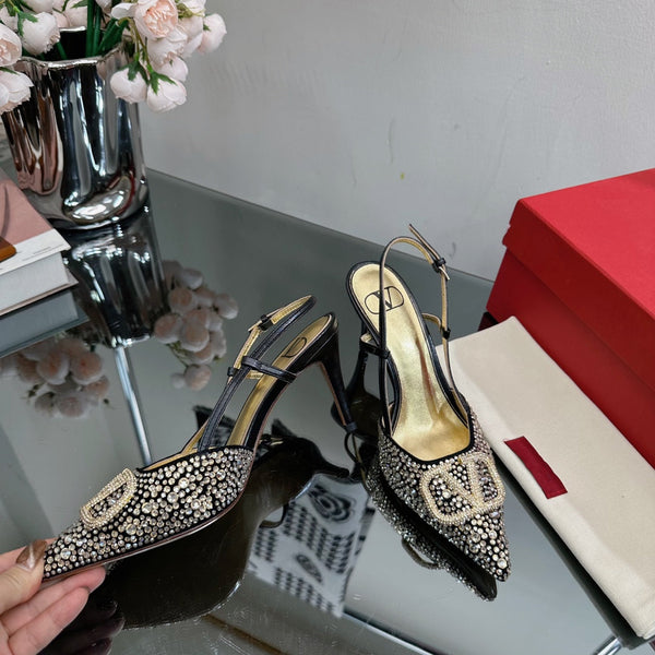 Vlogo Signature Slingback 70 in pelle di vitello nera dorata con cristalli