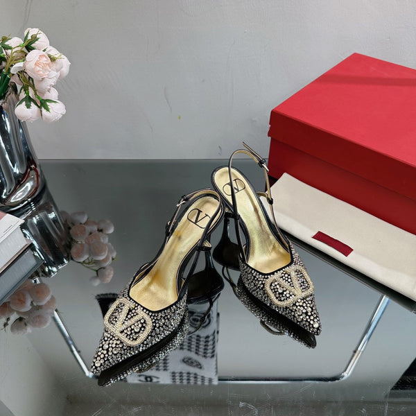 Vlogo Signature Slingback 70 in pelle di vitello nera dorata con cristalli