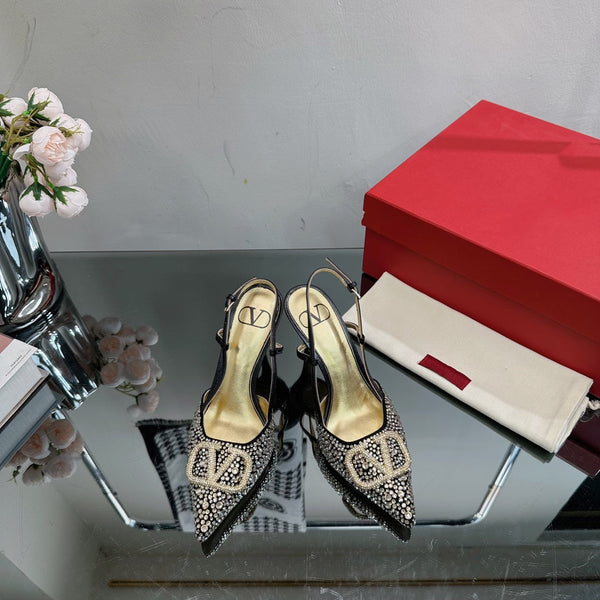 Vlogo Signature Slingback 70 in pelle di vitello nera dorata con cristalli