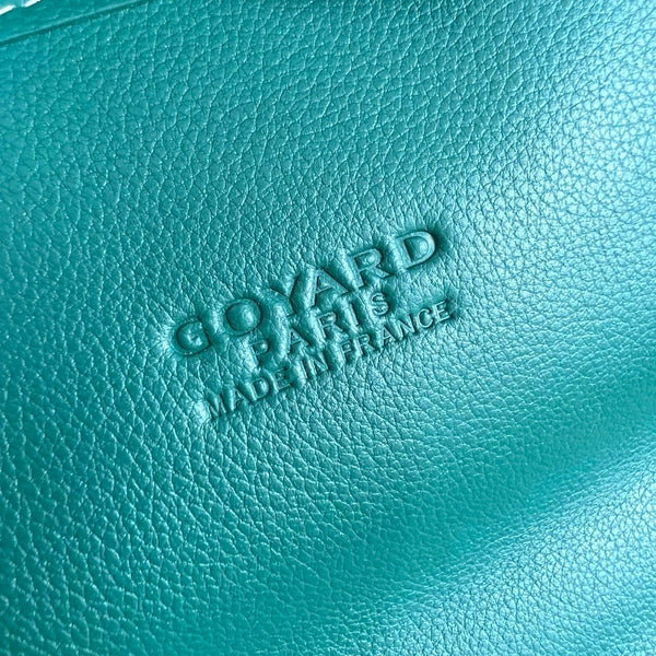 SAINT LÉGER BACKPACK 35 IN GREEN GOYARDINE CANVAS AND CALFSKIN WITH CARTOON PATCH