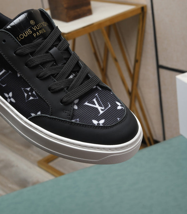 LV TRAINERS IN BLACK CALFSKIN AND MONOGRAM CANVAS