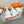 Sneaker HM Giga 50 in tela color salmone, pelle di capra bianca e arancione