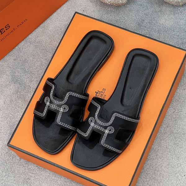 0ran sandal black white epsom