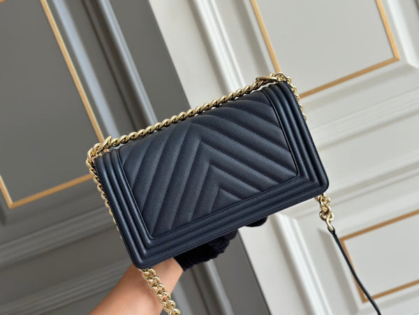 ragazzo taglia media 25 blu scuro chevron caviale ghw