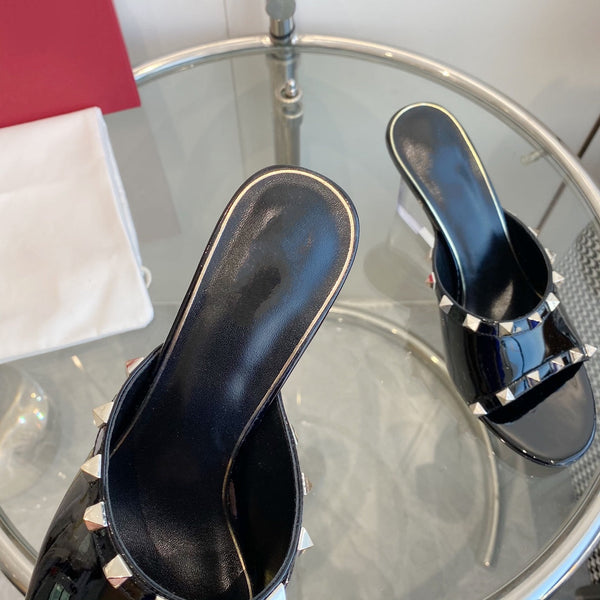 Mules Rockstud in pelle verniciata nera da 80 mm