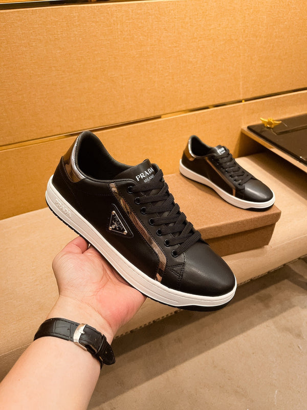 PRA SNEAKER IN BLACK CALFSKIN WITH GLOSSY GOLDEN