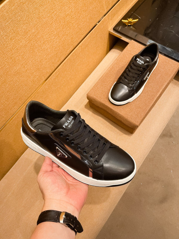 PRA SNEAKER IN BLACK CALFSKIN WITH GLOSSY GOLDEN