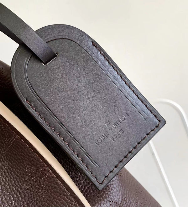 CARMEL 40 IN PELLE DI VITELLO PERFORATA CON MONOGRAMMA ROYAL RUBY