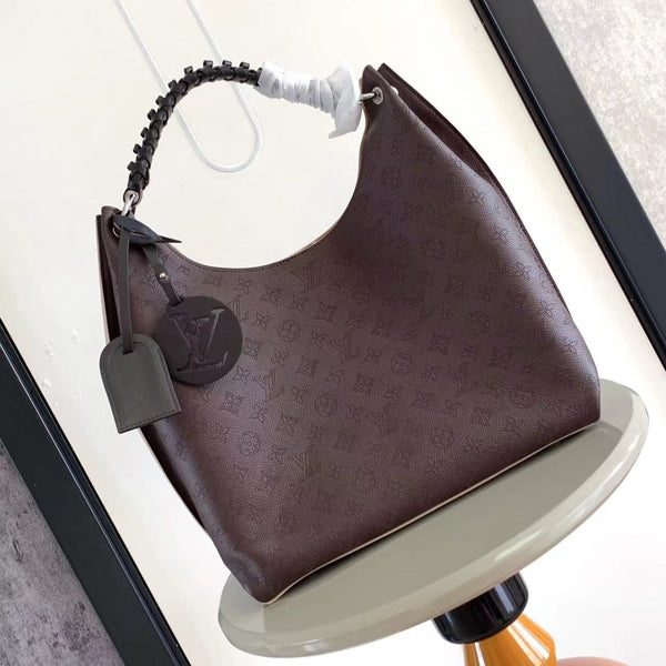 CARMEL 40 IN PELLE DI VITELLO PERFORATA CON MONOGRAMMA ROYAL RUBY