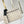 TRIO MESSENGER 25 IN CREAM BLUE MONOGRAM SHADOW CALFSKIN