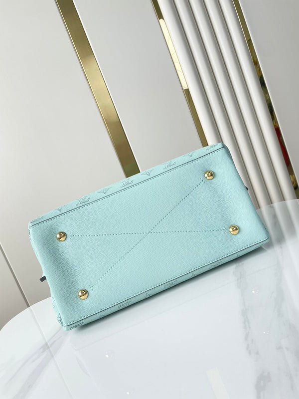 CARMEL 40 IN PELLE DI VITELLO TRAFORATA CON MONOGRAMMA AZZURRO