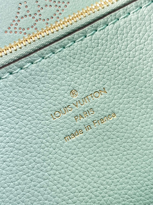 CARMEL 40 IN PELLE DI VITELLO TRAFORATA CON MONOGRAMMA AZZURRO