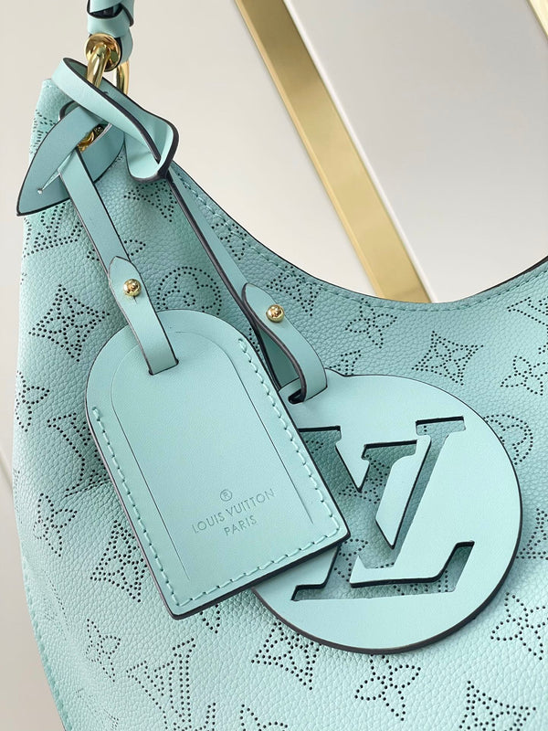 CARMEL 40 IN PELLE DI VITELLO TRAFORATA CON MONOGRAMMA AZZURRO