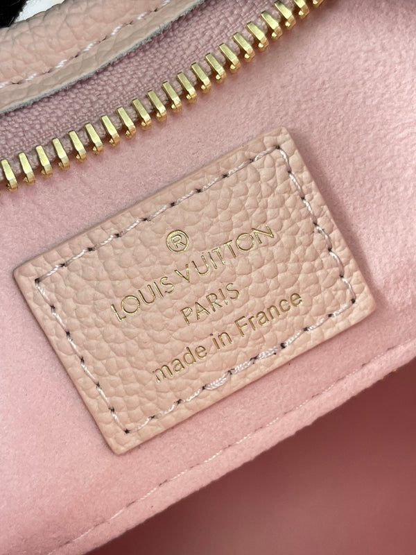 BORSA CARRYALL 29 IN PELLE CON STAMPA MONOGRAMMA ROSA CHIARO