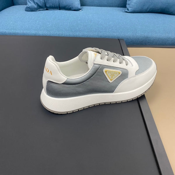 PRA SNEAKER IN WHITE CALFSKIN AND SILVER FABRIC WITH GOLDEN LOGO
