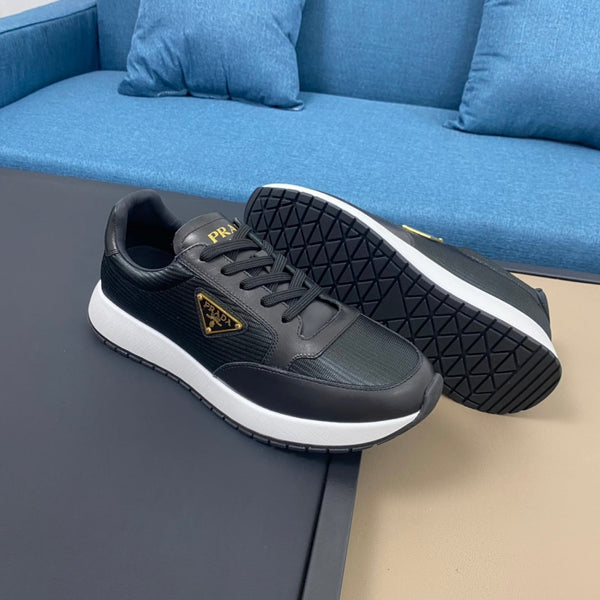PRA SNEAKER IN BLACK CALFSKIN AND FABRIC WITH GOLDEN LOGO