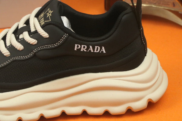 PRA SNEAKER IN BLACK CALFSKIN AND BREATHABLE MESH