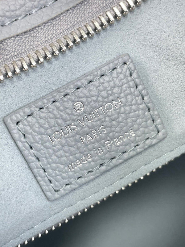 CARRYALL PM 29 IN BEAU BLUE MONOGRAM EMPREINTE LEATHER