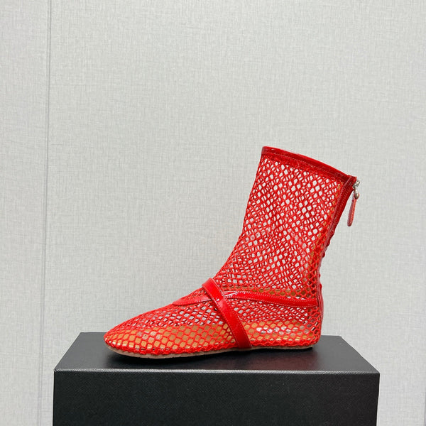ALAIA SHORT BOOTS IN ORANGE RED MESH FISHNET