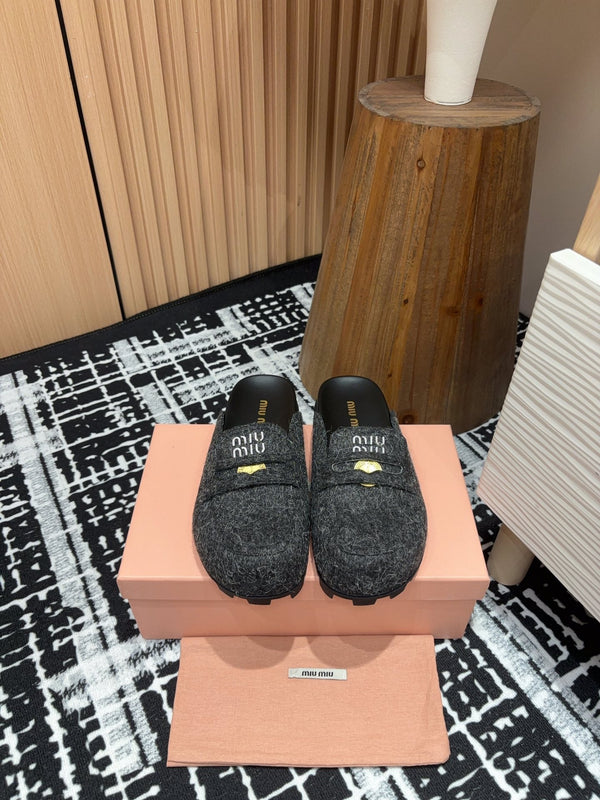 Miu slippers Black Original Wool