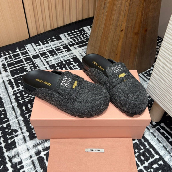 Miu slippers Black Original Wool