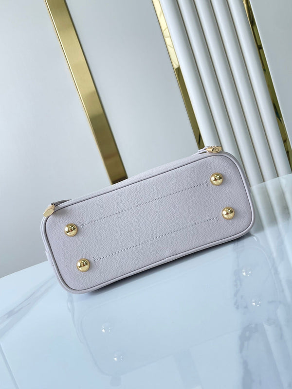 FLORE 28 IN PELLE DI VITELLO PERFORATA BIANCA