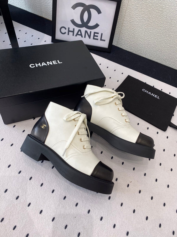 LOW-CUT BOOTS IN BLACK MIX WHITE CALFSKIN