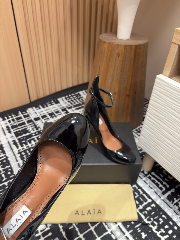 Décolleté Alaia Decollete 105mm in pelle di vacchetta nera lucida 121909