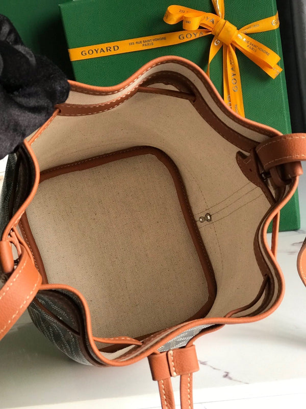 PETIT FLOT BUCKET BAG 22 IN BLACK GOYARDINE CANVAS AND TAN LAMBSKIN TRIM