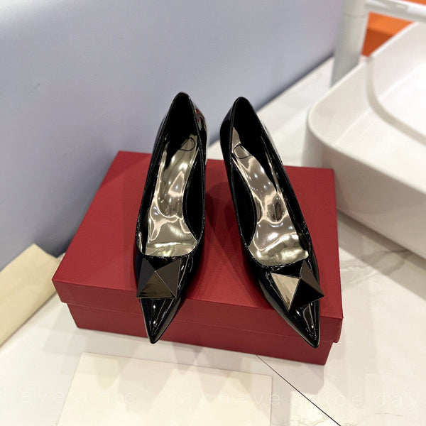 One Stud Black Patent Black Leather Pump