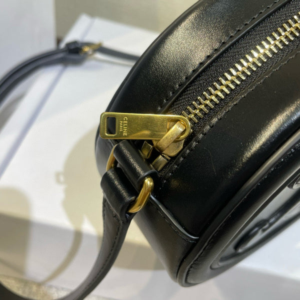 SMOOTH CALFSKIN 20 OVAL CINNAMON BLACK BAG