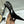 SL SLINGBACK PUMPS 100MM IN BLACK CALFSKIN PATENT LEATHER