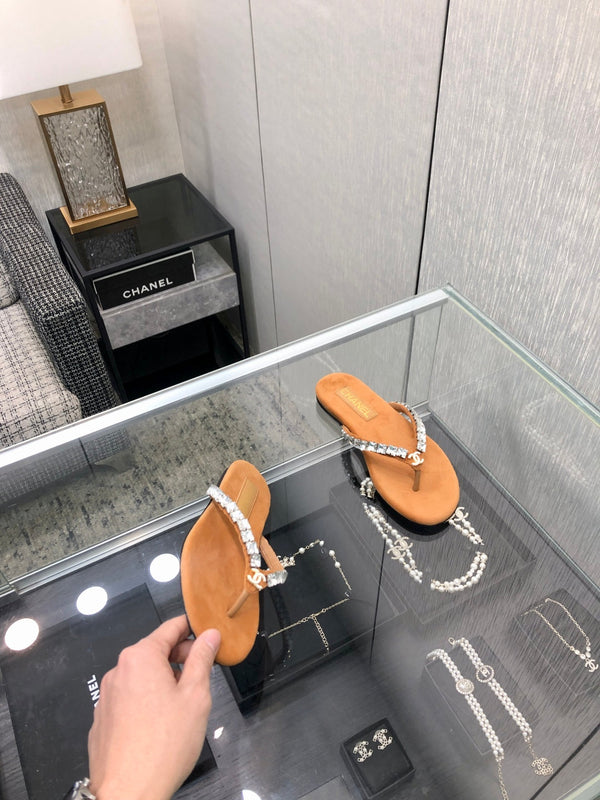 THONG SLIDE IN BRONZE BROWN SUEDE WITH WHITE CRYSTALS