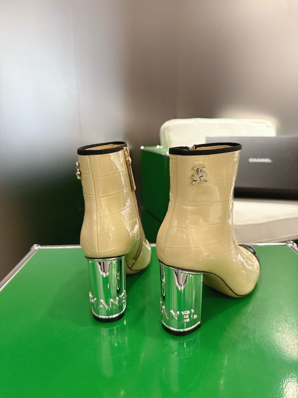 Chanel 2025𝐒𝐒 High Heeled Ankle Boots Light Beige & Black Glossy Leather 507545