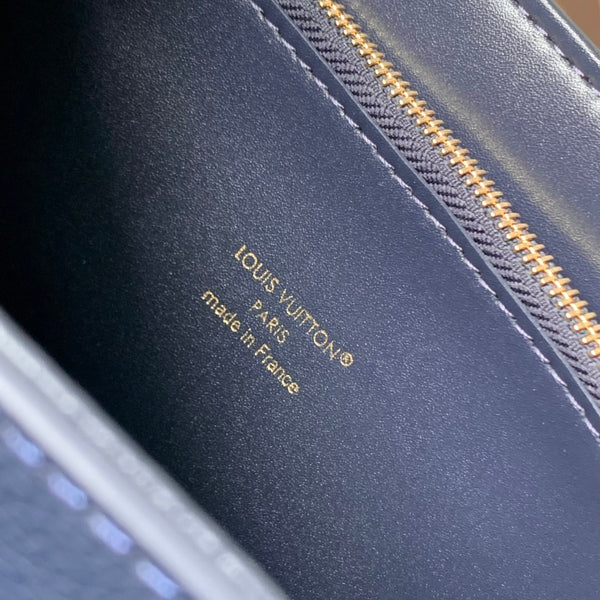 Twist MM Slim 23cm Dark Blue Calfskin 251410