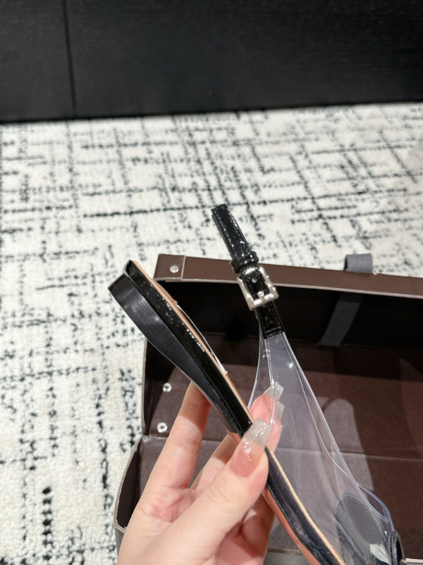 slingback alaia piatte in pelle di agnello nera ottica con cuore