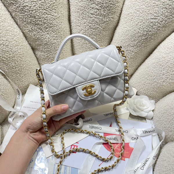 Borsa a tracolla CC 25P Mini con manico superiore da 20 cm, pelle di vitello grigia, finiture dorate