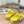 POOL GRAFFITI CROCS SLIDE SANDALS IN YELLOW AND BLACK RUBBER