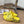 POOL GRAFFITI CROCS SLIDE SANDALS IN YELLOW AND BLACK RUBBER