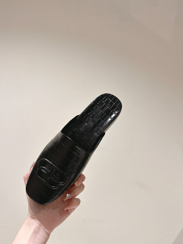 MULES PIATTI IN PELLE DI VITELLO LUCIDA GOFFRATA COCCODRILLO NERA