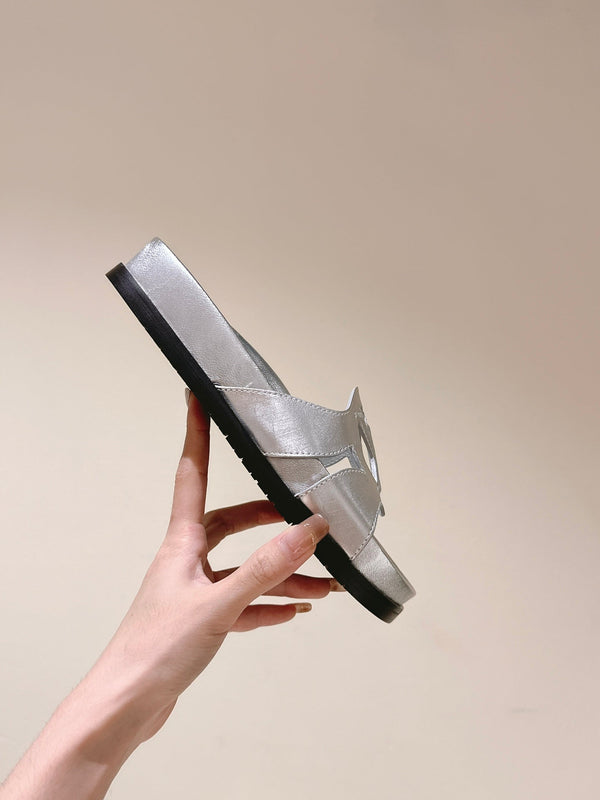 lv sandal isola flat mule silver metalic calfskin