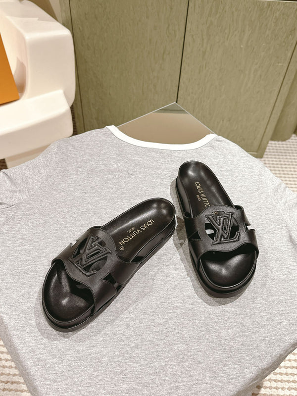 lv sandal isola flat mule black calfskin