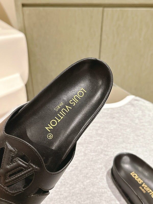 lv sandal isola flat mule black calfskin