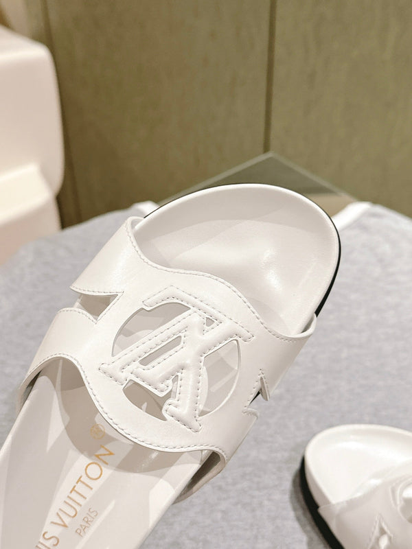 lv sandal isola flat mule white calfskin